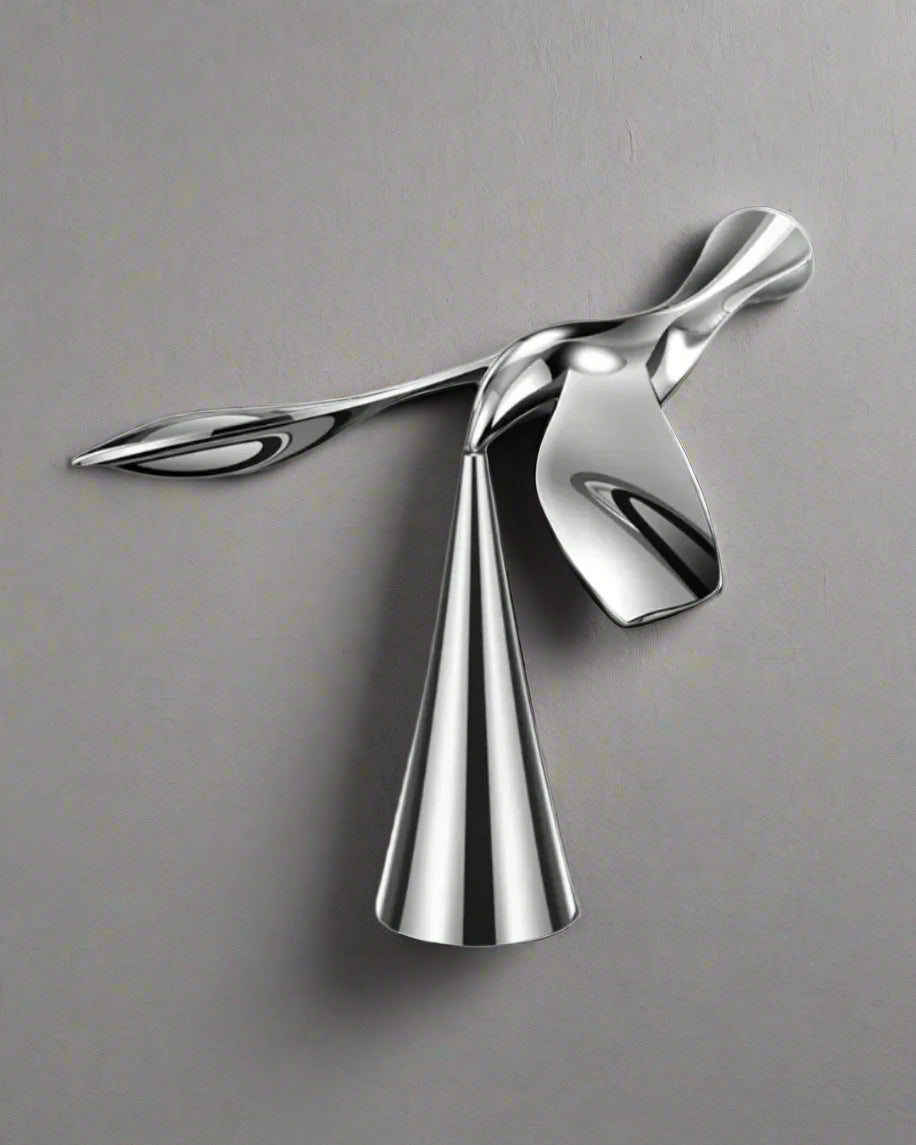 Metallic bottle opener of a bird.